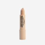 Corrector cremoso en barra con avena, trigo y vitamina E